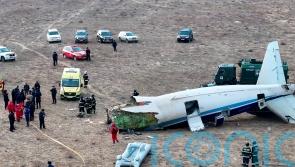 Four bodies recovered and dozens more feared dead after Kazakhstan plane crash
