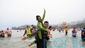 Romantic proposal makes waves at Tenby Boxing Day swim