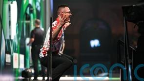 Damon Heta hits nine-dart finish but still exits World Championship