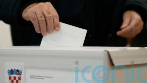 Croatia’s incumbent president wins most votes at polls but still faces runoff
