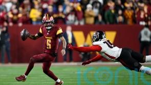 Washington Commanders win in overtime to clinch play-off berth