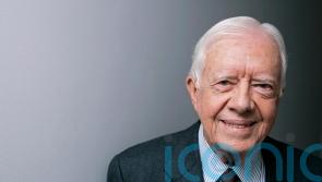 Joe Biden leads tributes to Jimmy Carter following ex-president’s death aged 100