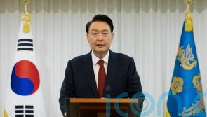 South Korean authorities seek warrant to detain impeached president