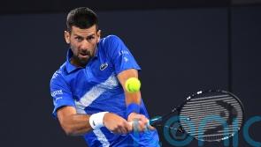 Nick Kyrgios upbeat despite defeat and Novak Djokovic wins in Brisbane