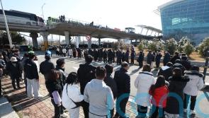 Families of South Korean plane crash victims visit site for memorial service