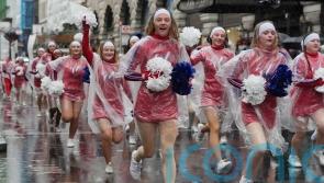 Revellers brave wind, rain and grey skies to watch New Year’s Day Parade