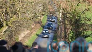 Community still in shock over deaths of father and son, funeral told