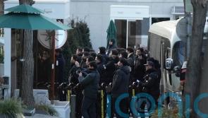 Investigators attempt to detain impeached South Korean president
