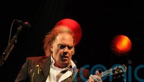 Neil Young confirmed as first Glastonbury headliner after backtracking on offer
