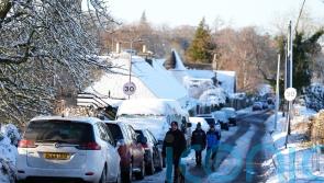 Heavy snow and freezing rain sweep in as amber warnings come into force
