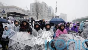 South Korean protesters brave cold to demand Yoon arrest as deadline looms
