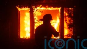 Huge wildfires kill two and destroy 1,000 structures in Los Angeles
