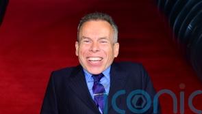 Warwick Davis dedicates Bafta Fellowship award to those who have supported him
