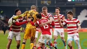 Doncaster shock Hull with penalty shootout victory to reach FA Cup round four