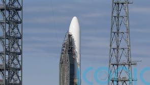 Jeff Bezos’ space company calls off debut launch of massive new rocket