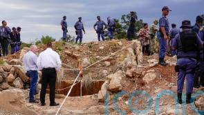 Rescuers bid to bring out survivors among hundreds trapped in South African mine