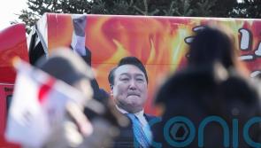 Investigators seek formal arrest for impeached South Korean President