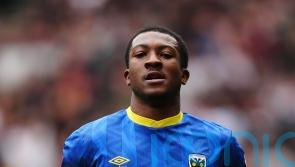 Josh Neufville’s sublime strike helps keep promotion-chasing Wimbledon on track