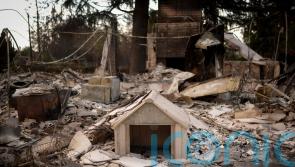 California officials warn against soaring rents after deadly firestorms