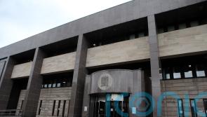 Man due in court after women allegedly attacked and flat set on fire