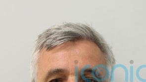 Drug traffickers identified after sending dog photo ordered to pay £1 million