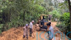 Death toll in deadly flooding and landslides in Indonesia rises to 21