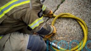 Homes evacuated after seven fire crews attend blaze near football stadium