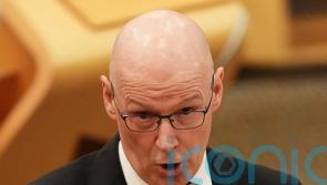 Swinney apologises over 50-hour A&E wait amid angry clashes on NHS performance