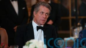 Hugh Grant calls for criminal investigation into activities of The Sun publisher