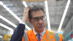 Tories hit out at ‘hypocrite’ Miliband as his department hires a photographer