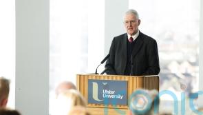 Benn challenges Stormont to reform public services and balance books
