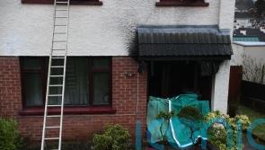 Police officers hailed after rescuing adults and children from burning house