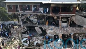 Bangladesh warns of stern action after house linked to ousted PM destroyed