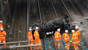 Major train line reopens after crashed car is removed from tracks