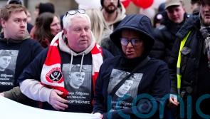 Family of boy stabbed at school lead march in his memory