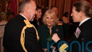 Submariners recall Queen delivering them tea and biscuits at palace reception