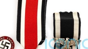 Auction house defends the inclusion of Nazi items in sale of militaria