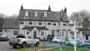 Police manhunt under way after woman injured at Kent pub