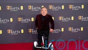 Warwick Davis found out about his Bafta fellowship award while ‘on the toilet’