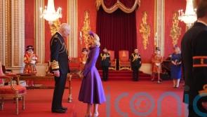 Strictly’s Amy Dowden discussed chemotherapy with Charles as she was made an MBE