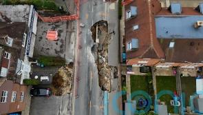 Investigations continue after sinkhole shuts Surrey street