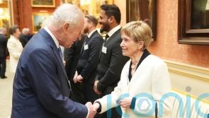 Volunteer, 95, who helped raise almost £2m for humanitarian causes meets King
