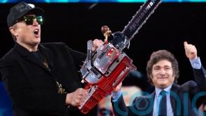 Musk wields chainsaw on stage at conservative conference