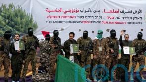 Israel delays release of Palestinian prisoners after Hamas frees six hostages