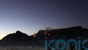 More than 100 firefighters battle blazes on mountain overlooking Cape Town