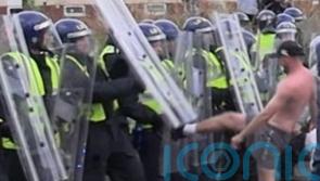 Man who attacked police protecting mosque jailed after admitting riot charge
