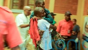 At least 11 dead and 65 hurt in DR Congo after blasts at M23 rally