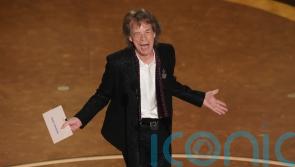 Mick Jagger jokes Bob Dylan turned Oscars down as he presents award