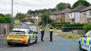 Third man charged with murdering mother and three children in house fire