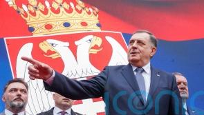 Bosnian officials challenge separatist laws before top court as tensions soar
